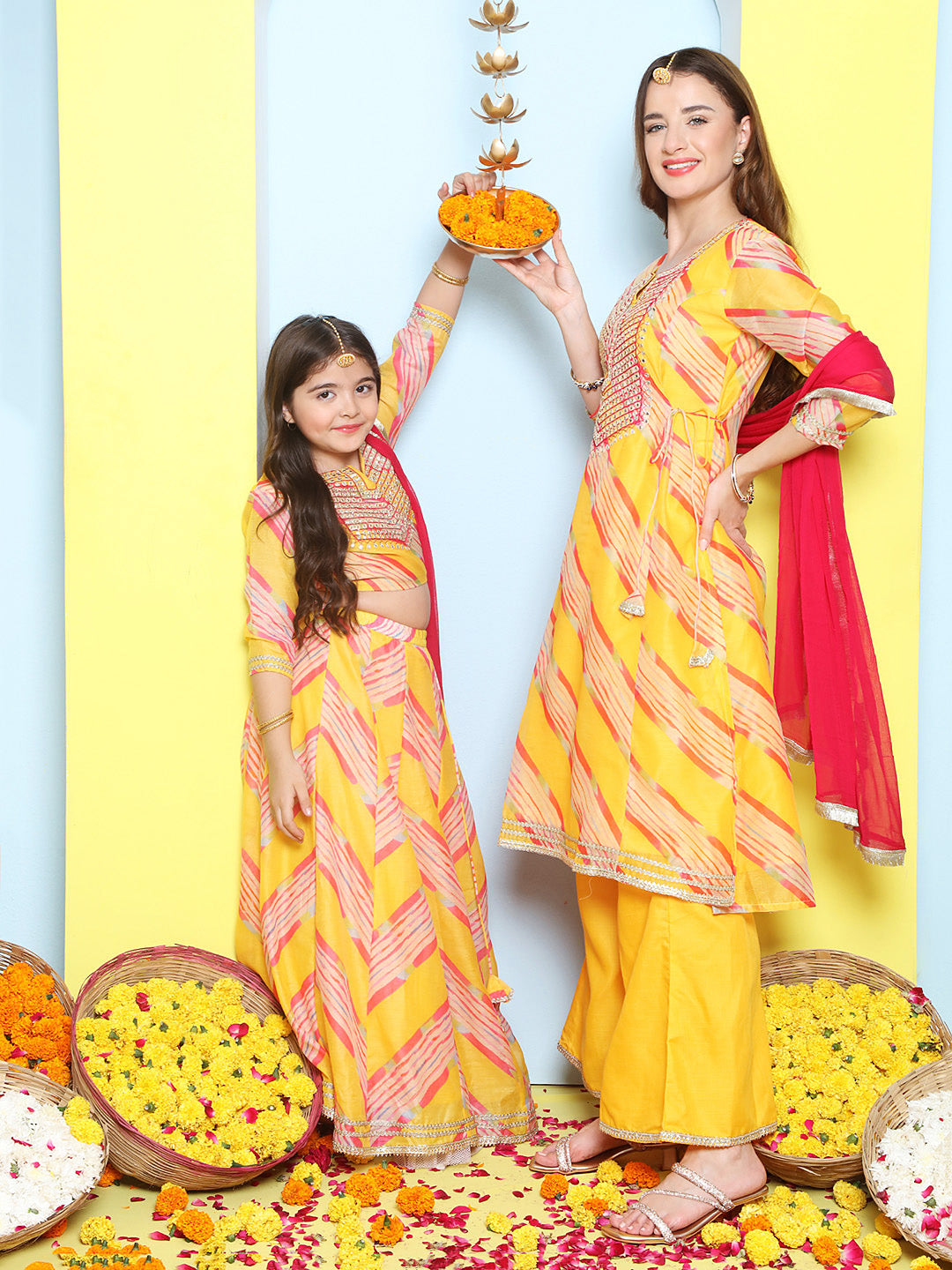 Yellow Leheriya Embroidered A-Line Kurta Set For Women & Lehenga Choli Set For Girl.