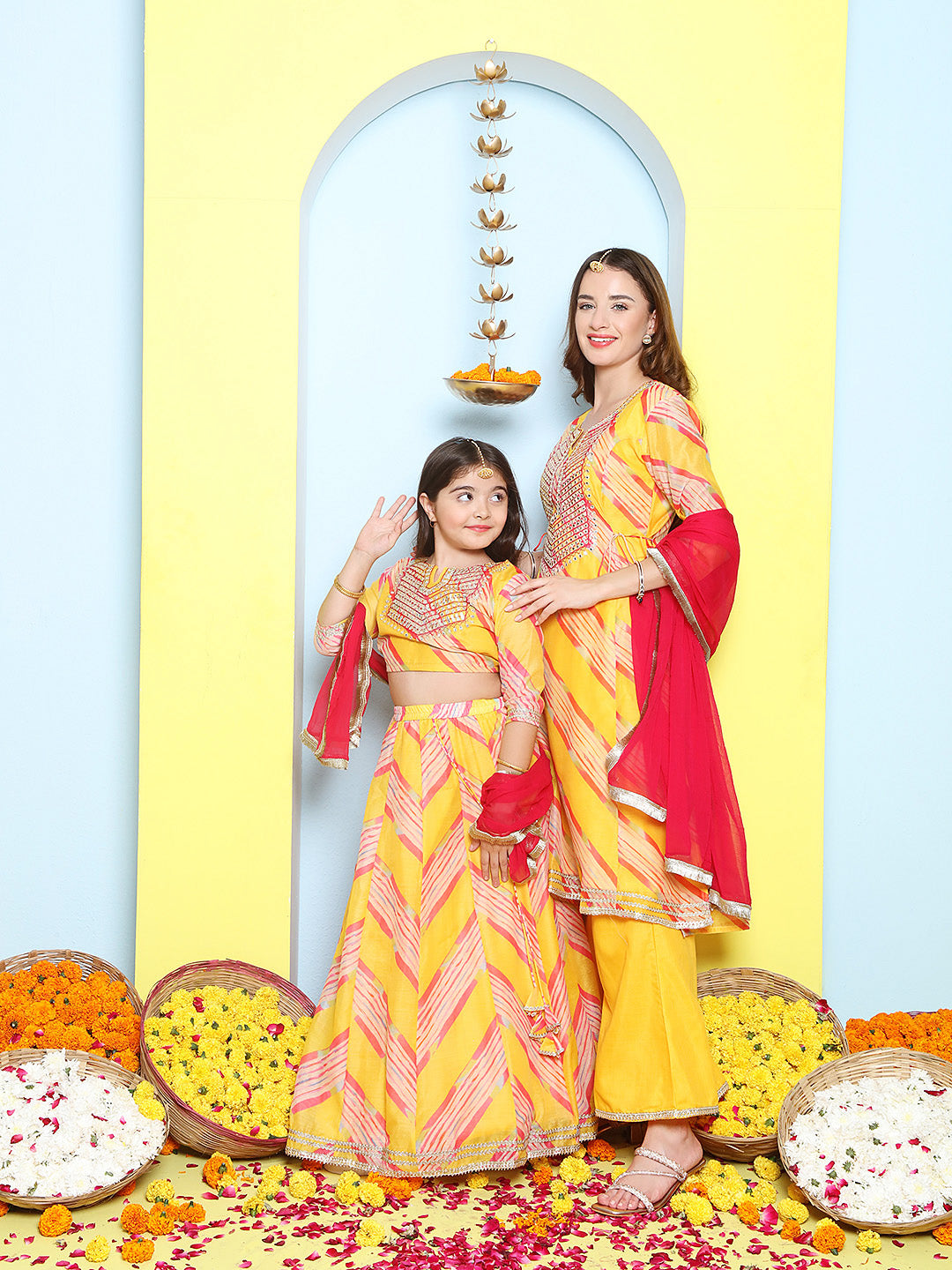 Yellow Leheriya Embroidered A-Line Kurta Set For Women & Lehenga Choli Set For Girl.