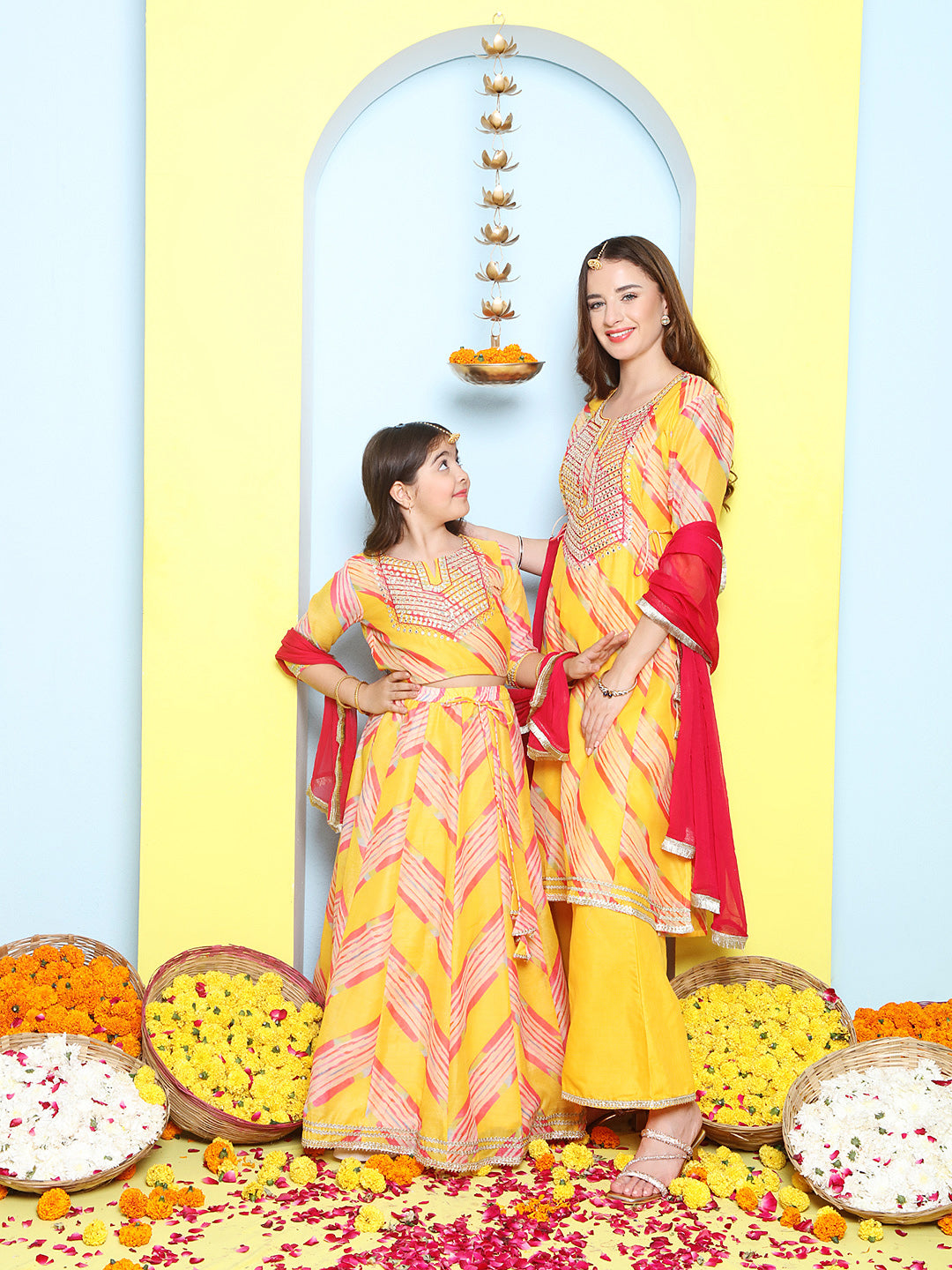 Yellow Leheriya Embroidered A-Line Kurta Set For Women & Lehenga Choli Set For Girl.