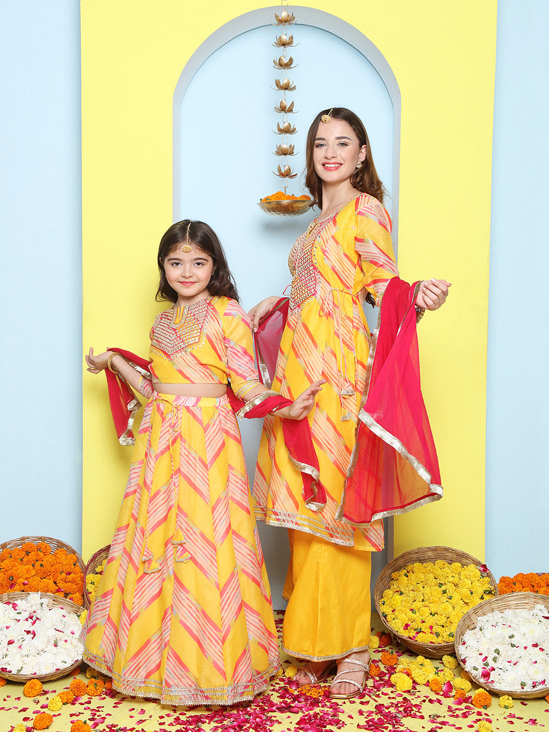 Yellow Leheriya Embroidered A-Line Kurta Set For Women & Lehenga Choli Set For Girl.