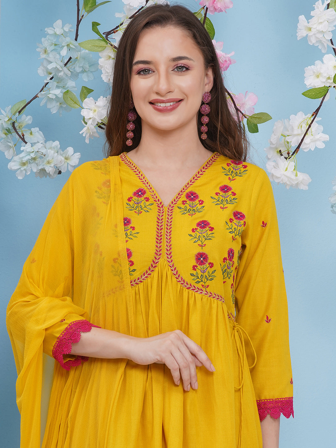 Bhama Couture Yellow Embroidered Flared Kurta with Palazzos Dupatta Set.