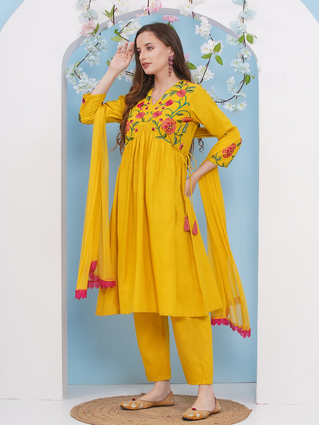 Bhama Couture Yellow Embroidered Flared Kurta with Palazzos Dupatta Set.
