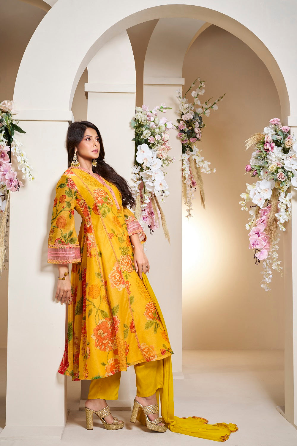 Bhama Couture Jennifer Winget Yellow Colour Floral Printed Flared Anarkali Kurta with Palazzos Dupatta.