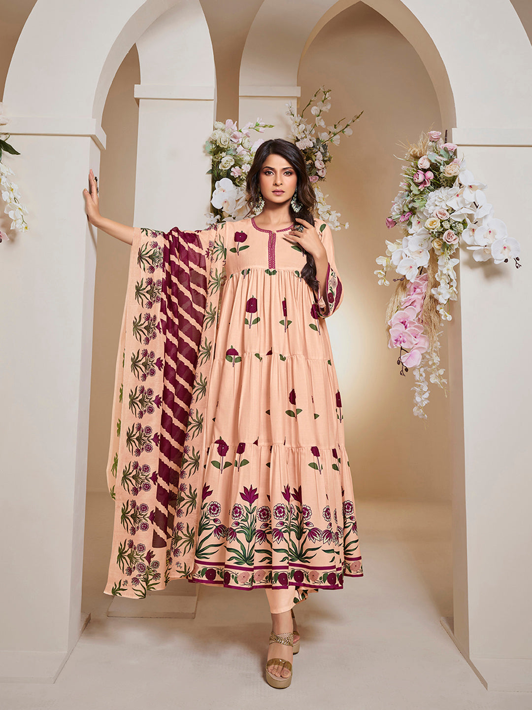 Bhama Couture Jennifer Winget Peach Floral Printed Flared Tier Anarkali Kurta with Palazzos Dupatta.