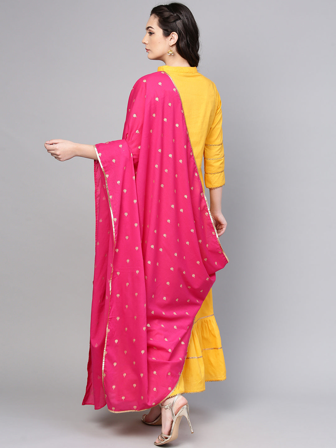 Yellow Solid Kurta With Sharara And Dupatta.