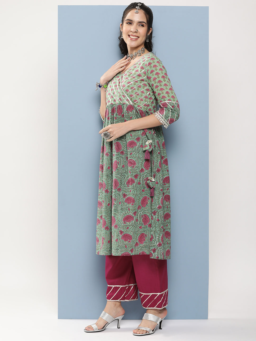 Bhama Couture Olive Green Floral Print High-Slit Kurta With Gotta Patti Details With Pink Solid Palazzos.