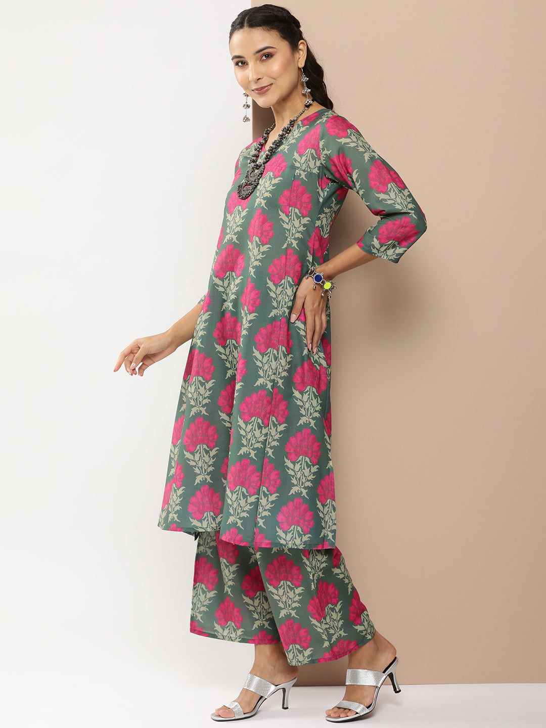 Bhama Couture Green Floral Print A-Line Kurta With Green Floral Print Palazzo.