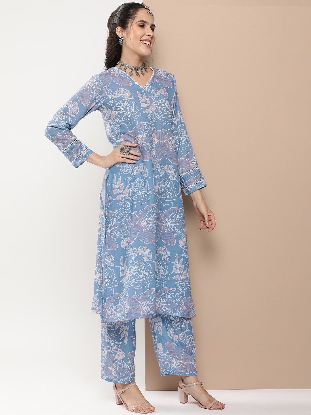 Bhama Couture Blue Floral Print Kurta With Lace Details With Blue Floral Print Palazzos.