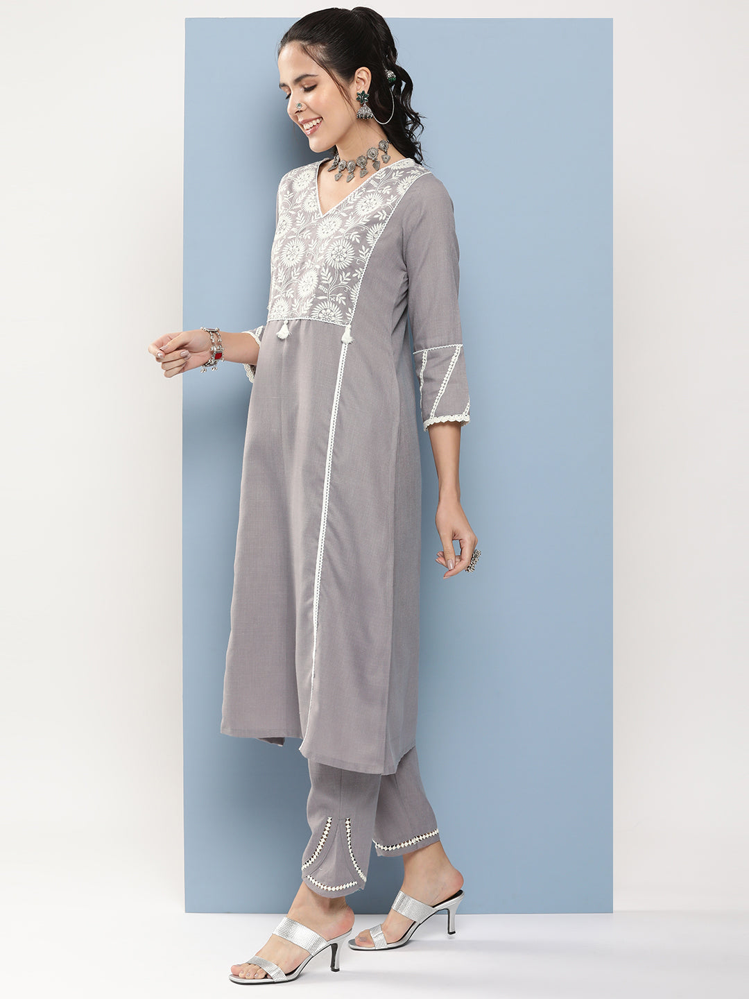 Bhama Couture Grey Embroidered A-Line Kurta With Lace Detailing With Grey Solid Palazzos.