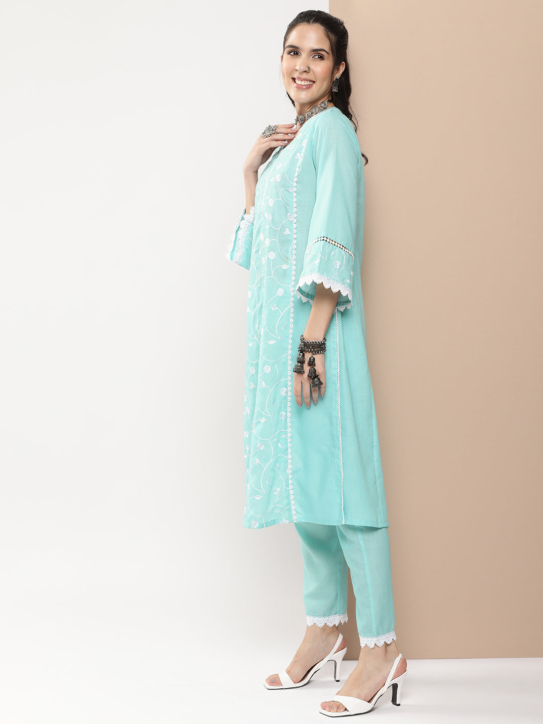 Bhama Couture Blue Embroidered Straight Kurta With Lace Details With Blue Solid Palazzos.