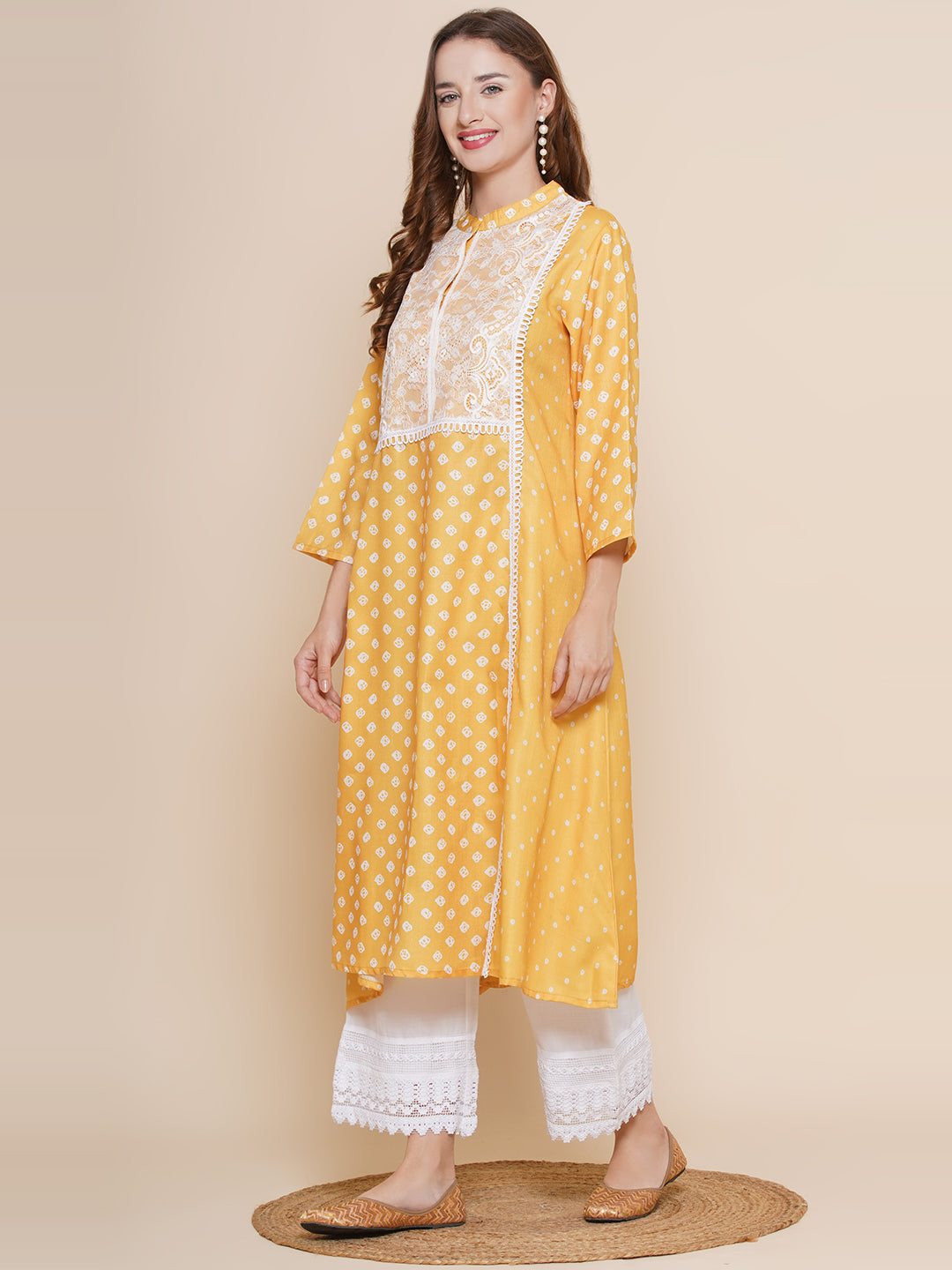 Women Yellow Bandhani Printed Lace Details Kurta with Off White lace Work Palazzos