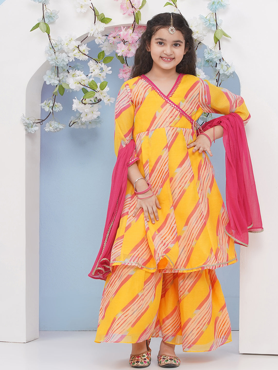 Bitiya by Bhama Girls Yellow Leheriya Printed Angrakha Kurta with Sharara with dupatta