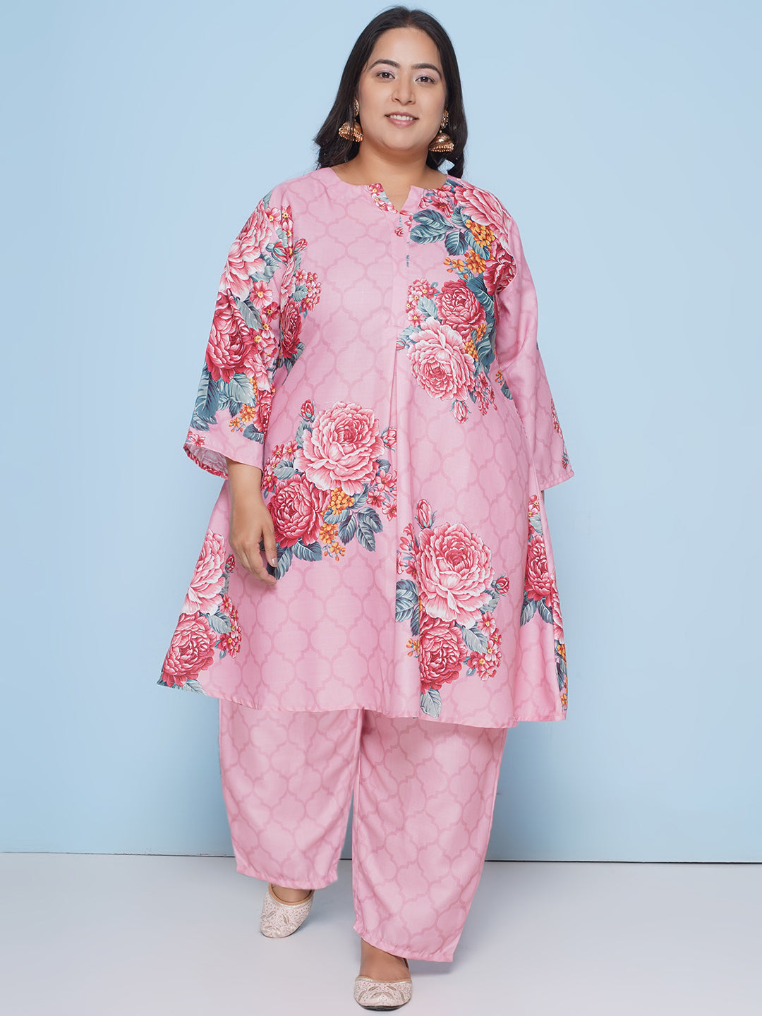 Peach color kurta with lace detailing on sleeves and neck