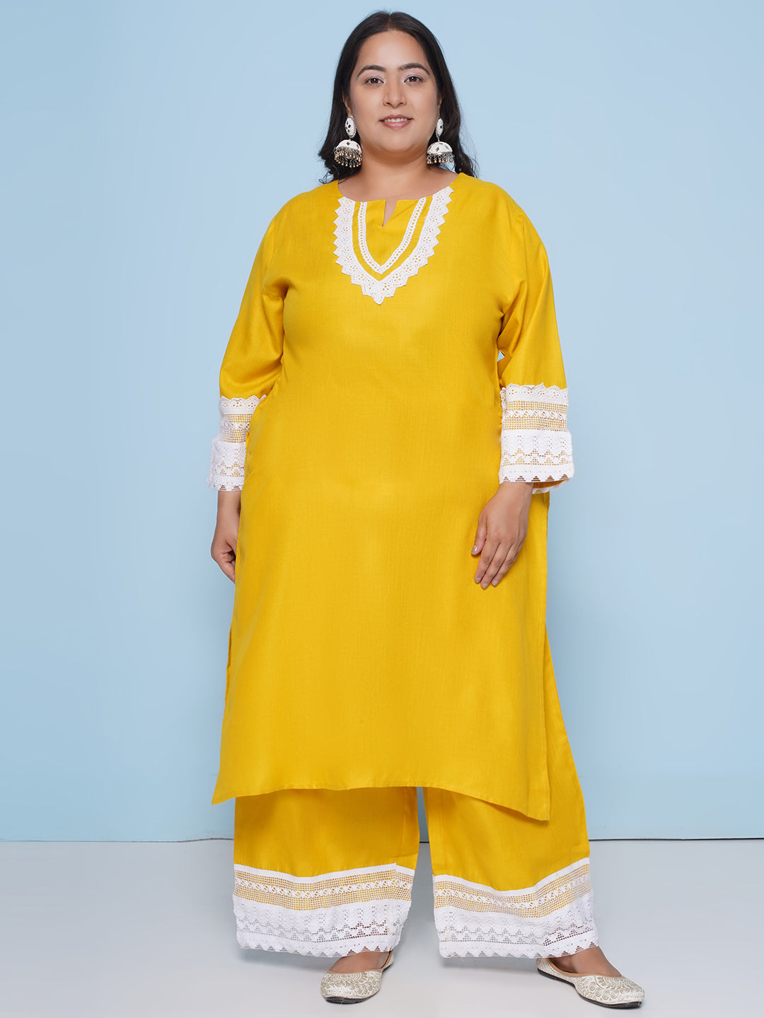 Yellow color kurta with lace detailing on sleeves and neck