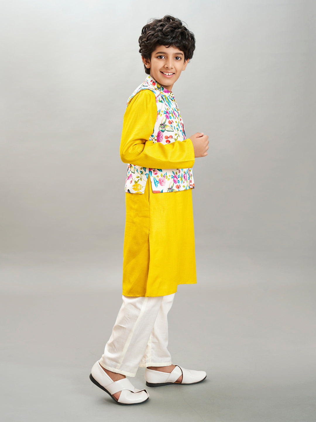Bittu By Bhama Boys yellow kurta & off white pajama with a multi print jacket