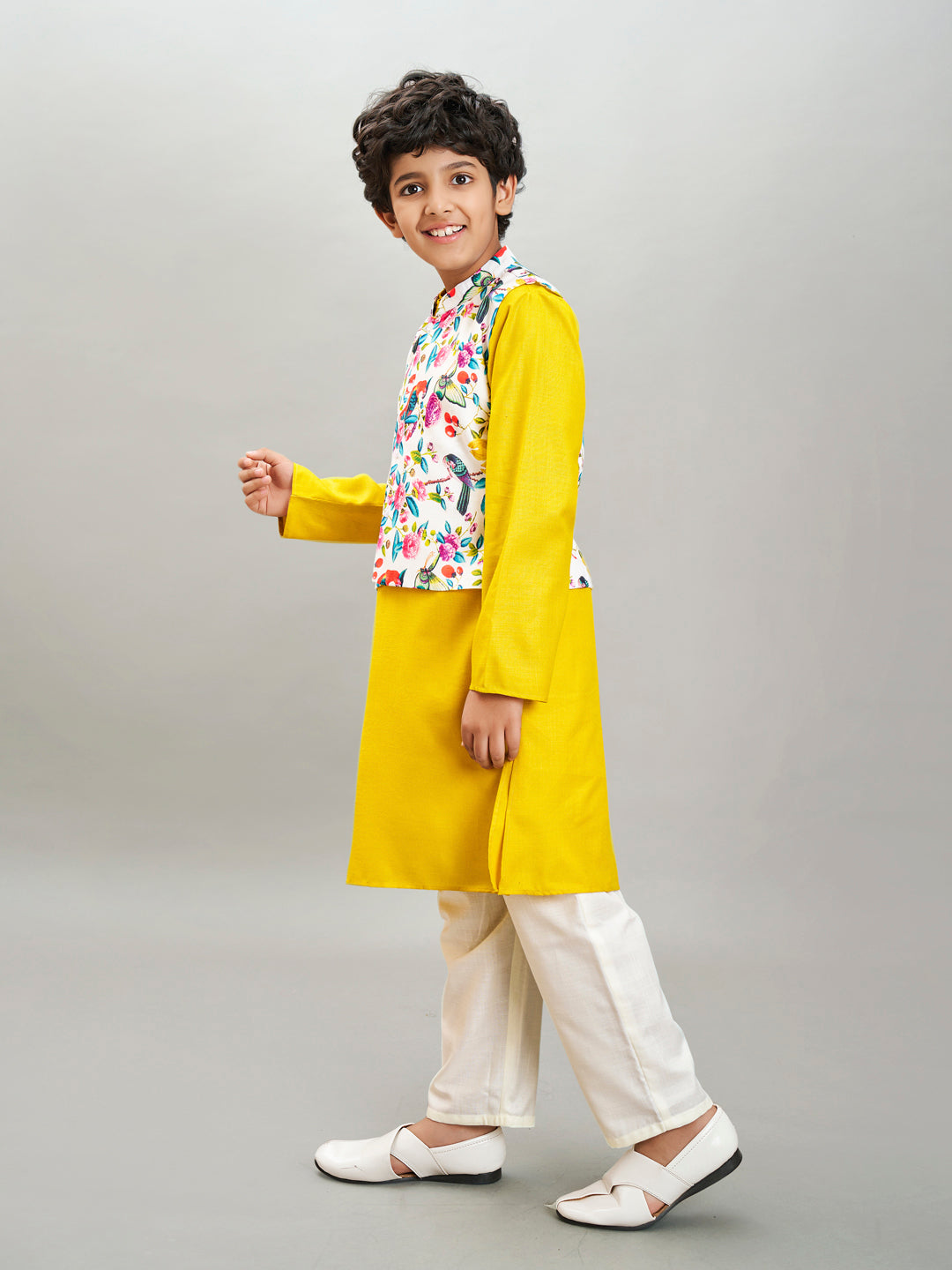 Bittu By Bhama Boys yellow kurta & off white pajama with a multi print jacket