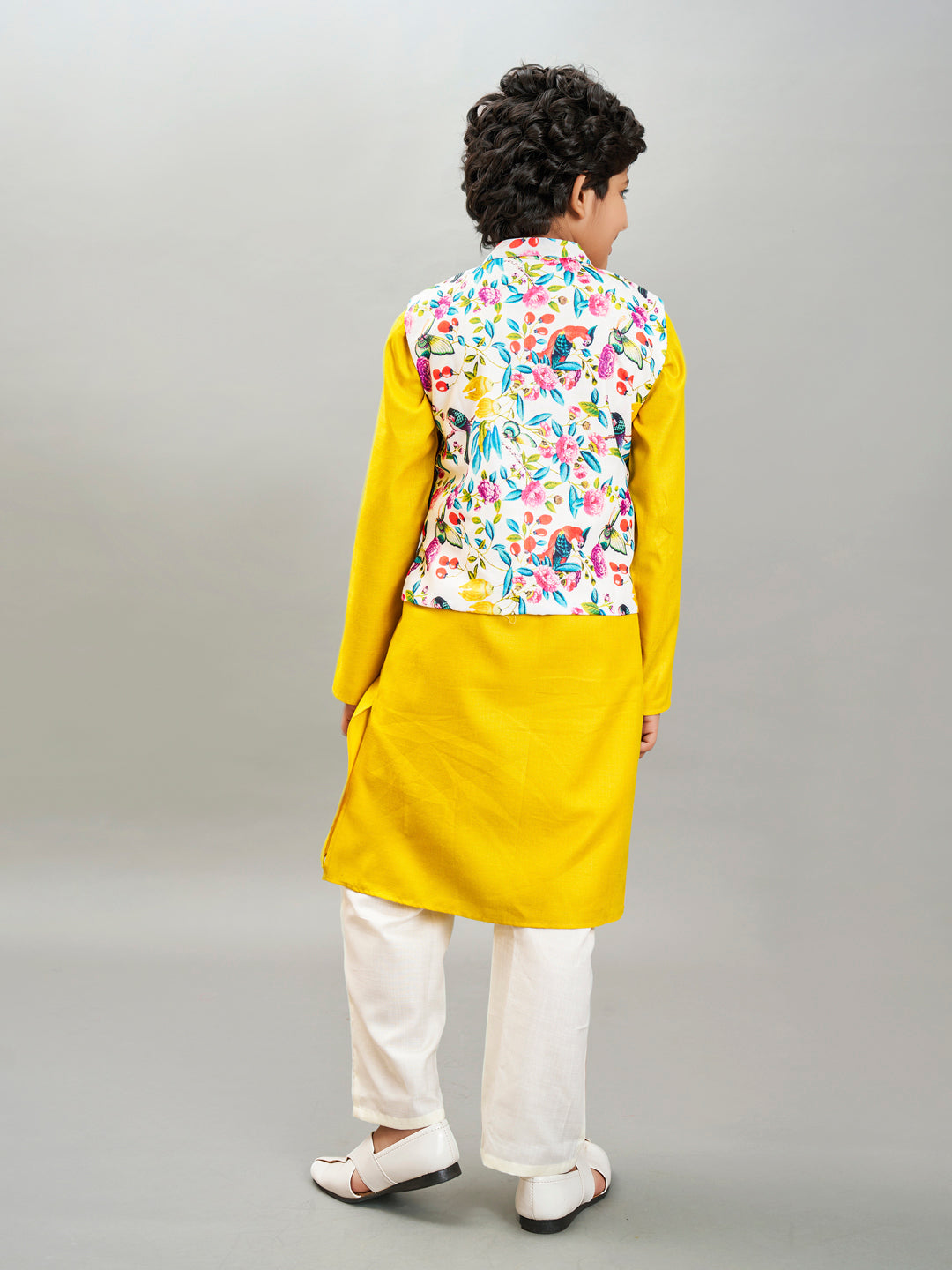 Bittu By Bhama Boys yellow kurta & off white pajama with a multi print jacket