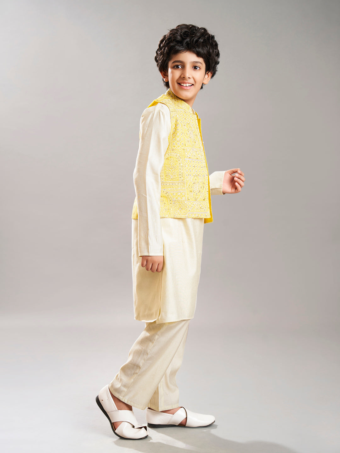 Bittu By Bhama Boys off white kurta pajama with yellow modal booti jacket