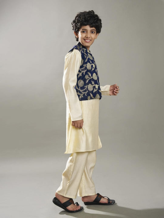 Bittu By Bhama Boys off white kurta pajama with a blue jacquard jacket