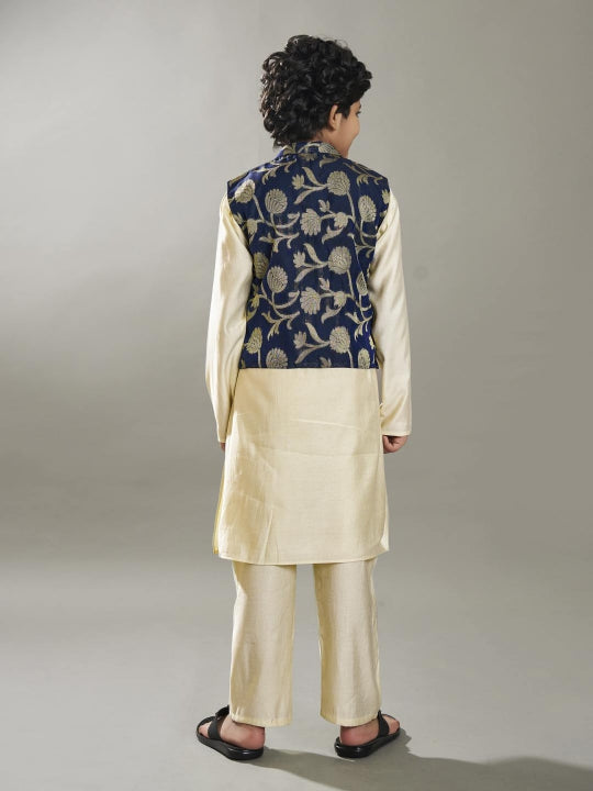 Bittu By Bhama Boys off white kurta pajama with a blue jacquard jacket