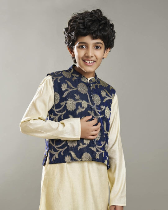 Bittu By Bhama Boys off white kurta pajama with a blue jacquard jacket