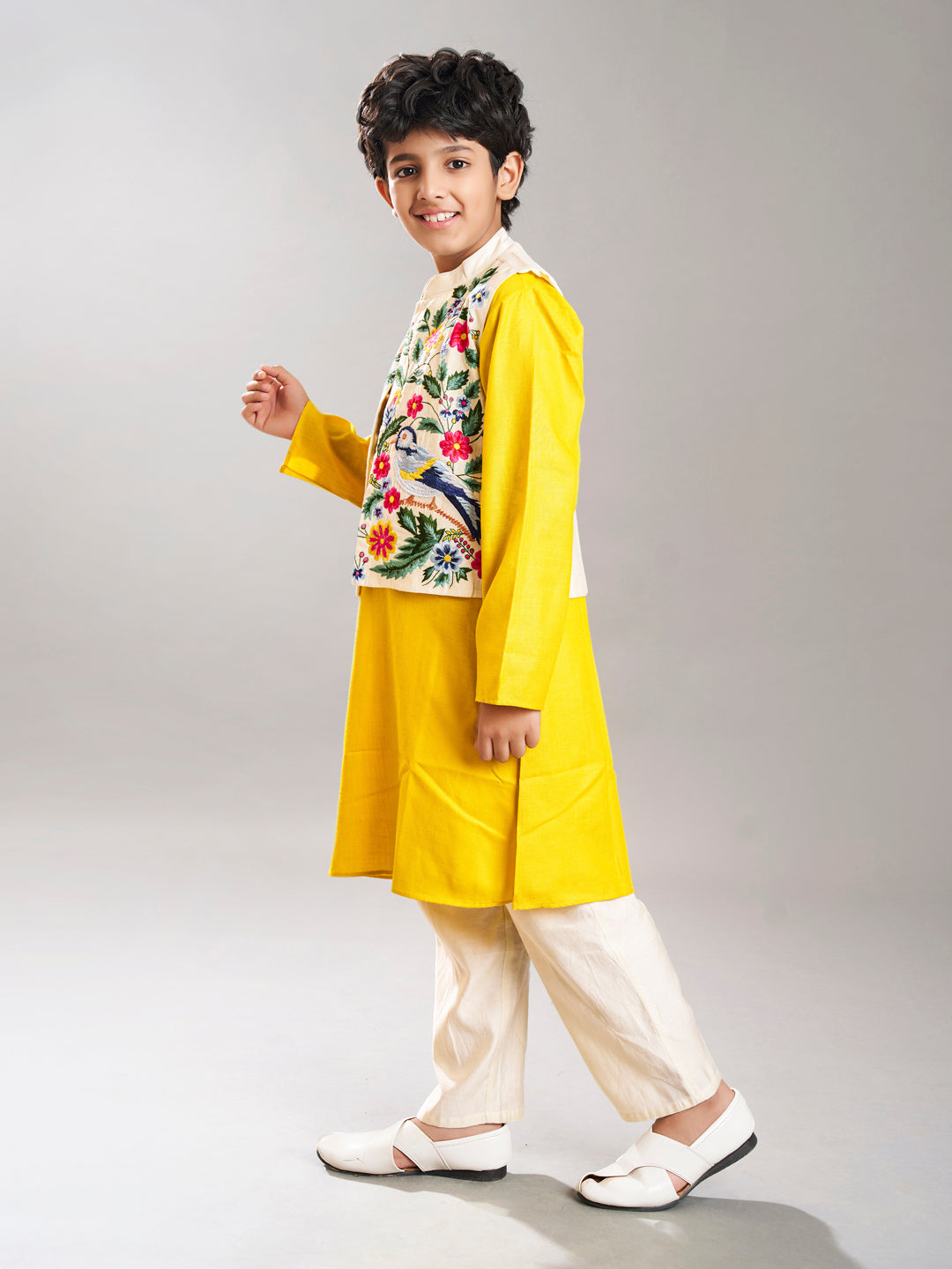 Bittu By Bhama Boys Yellow kurta & off white pajama with a off white embroidery  jacket