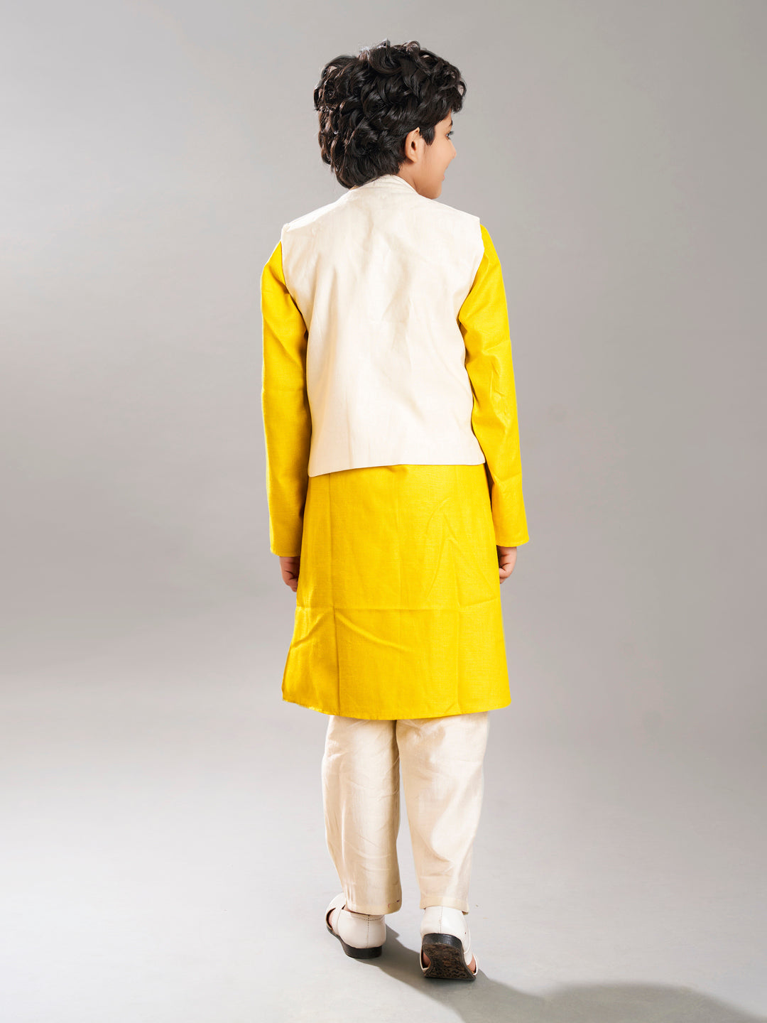 Bittu By Bhama Boys Yellow kurta & off white pajama with a off white embroidery  jacket