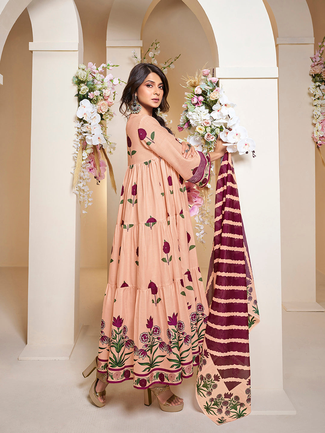 Bhama Couture Jennifer Winget Peach Floral Printed Flared Tier Anarkali Kurta with Palazzos Dupatta.