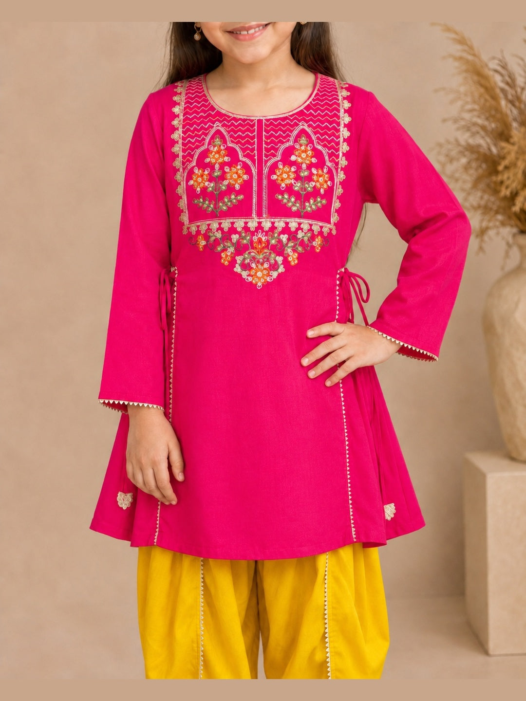 Bitiya By Bhama Girls Pink Embroidered Kurta With Mustard Dhoti Set.