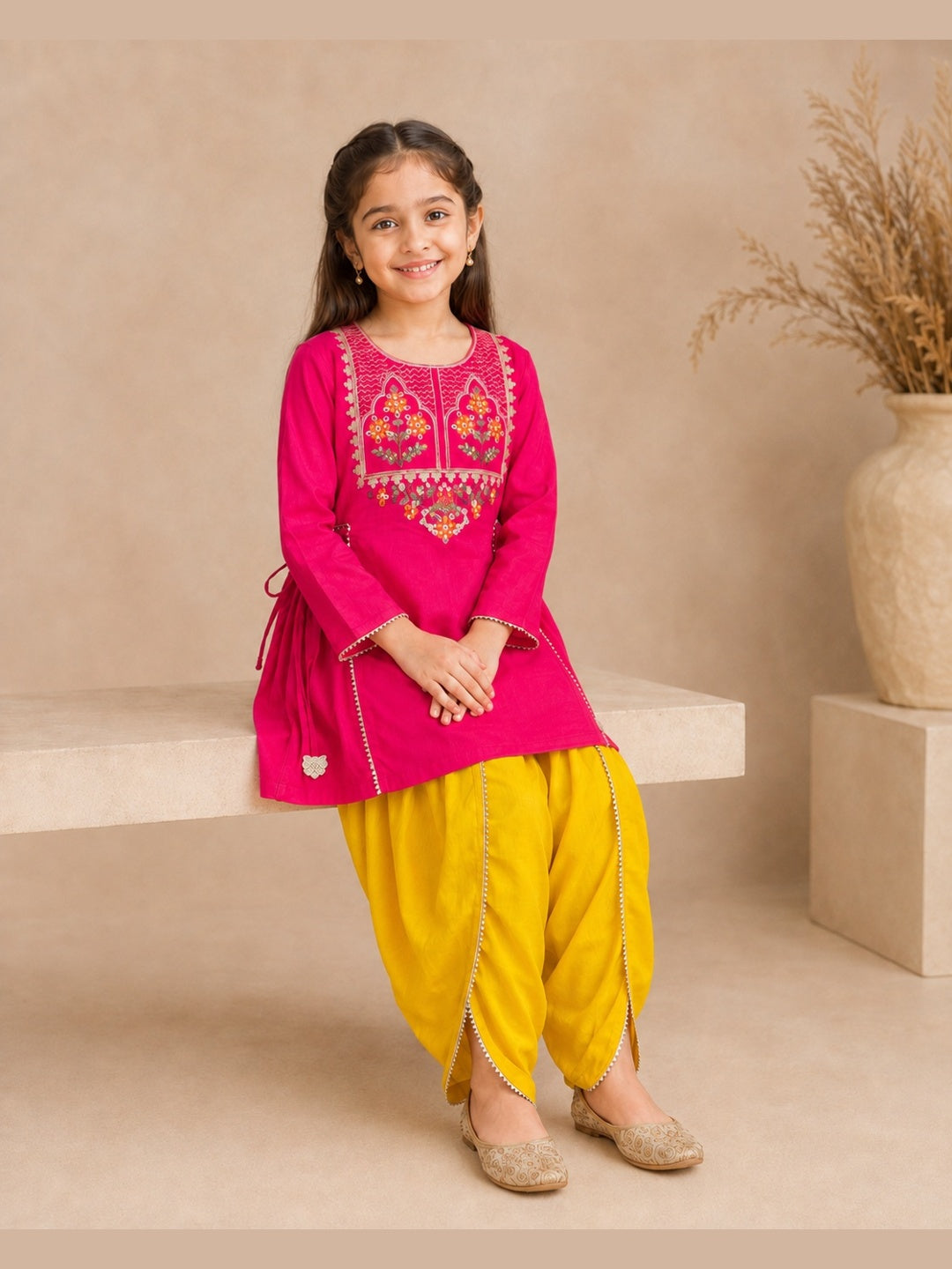 Bitiya By Bhama Girls Pink Embroidered Kurta With Mustard Dhoti Set.