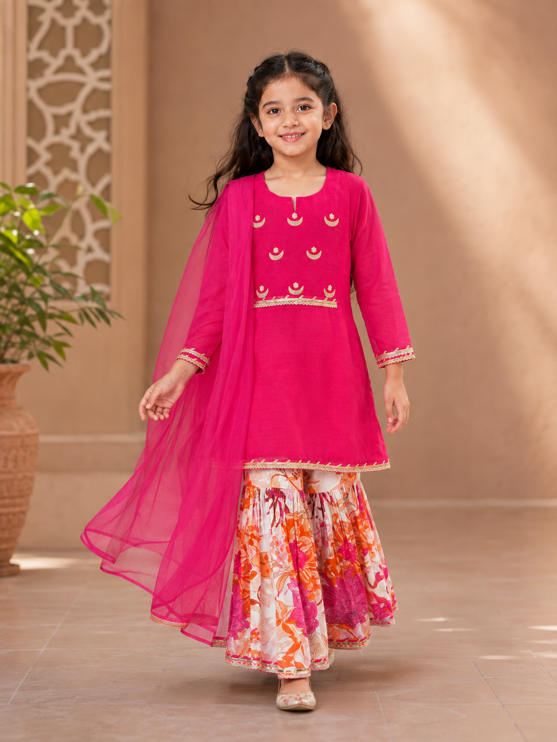 Bitiya By Bhama Girls Pink Kurta With Floral Printed Sharara And Dupatta.