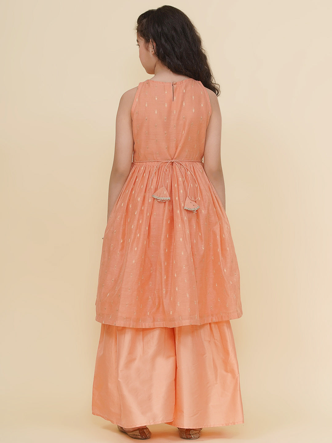 Bitiya by Bhama Girls Peach Self design Kurta with Sharara
