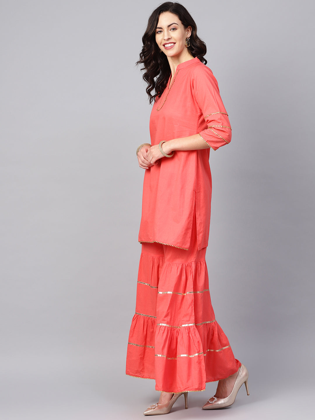 Peach Solid Kurta With Sharara And Dupatta