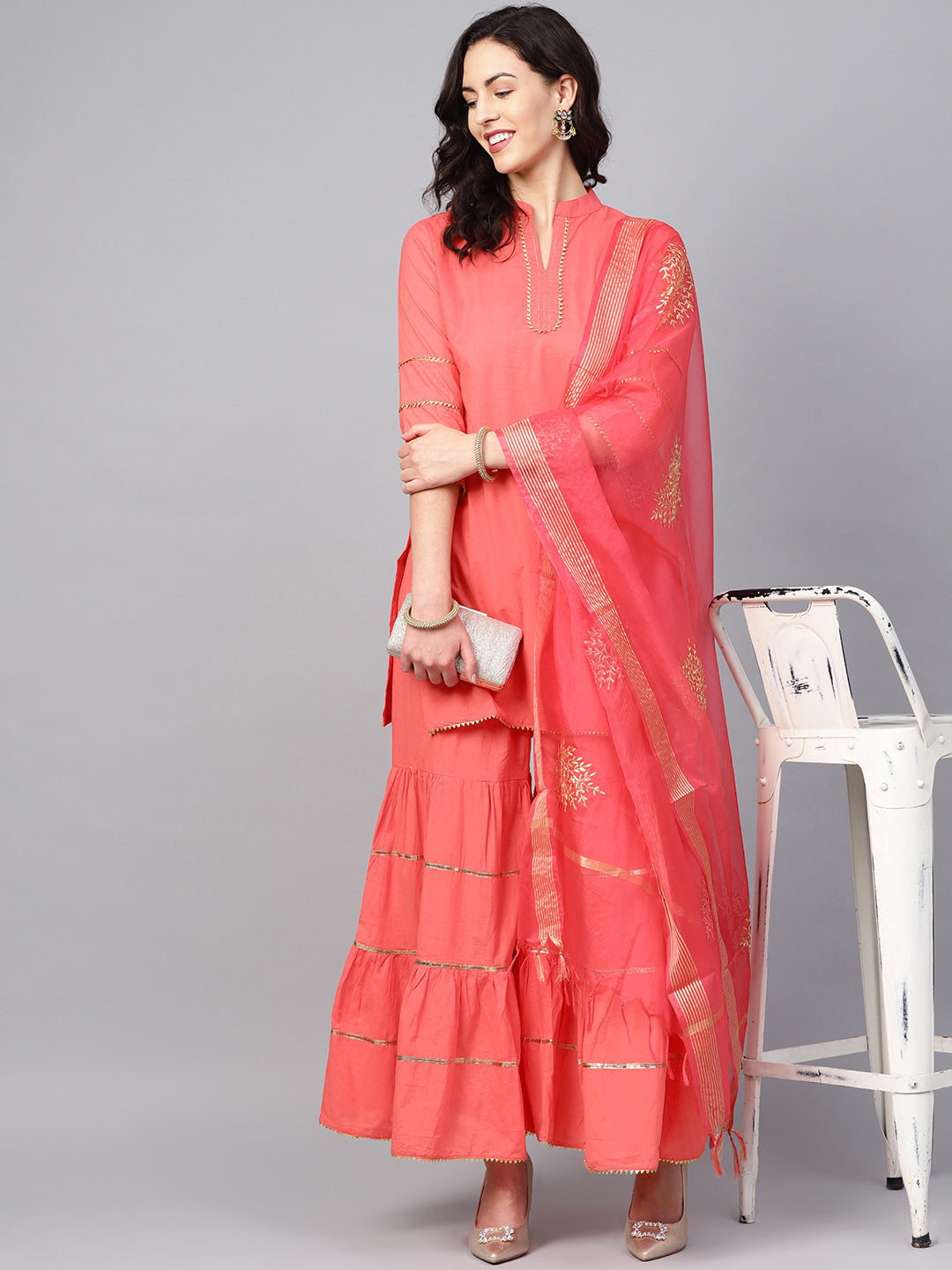 Peach Solid Kurta With Sharara And Dupatta