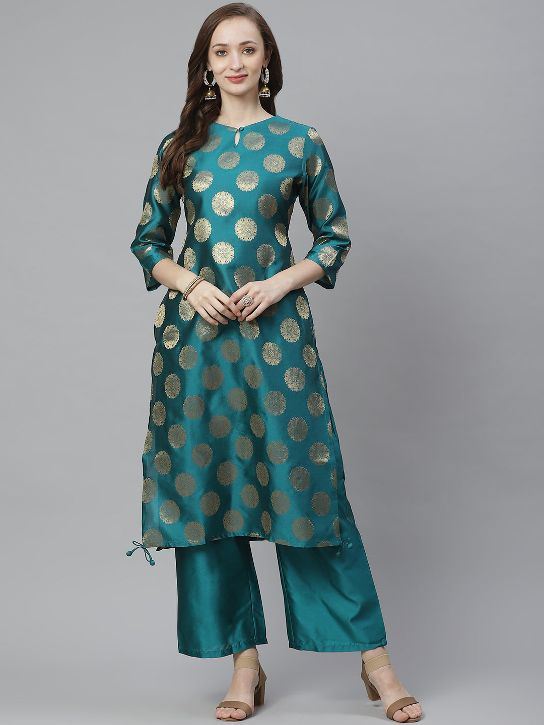 Teal green and golden woven design kurta with palazzos