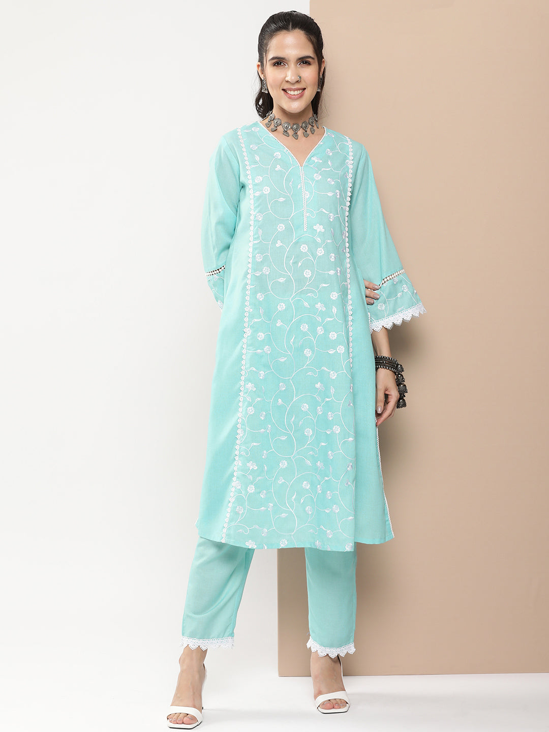 Bhama Couture Blue Embroidered Straight Kurta With Lace Details With Blue Solid Palazzos.