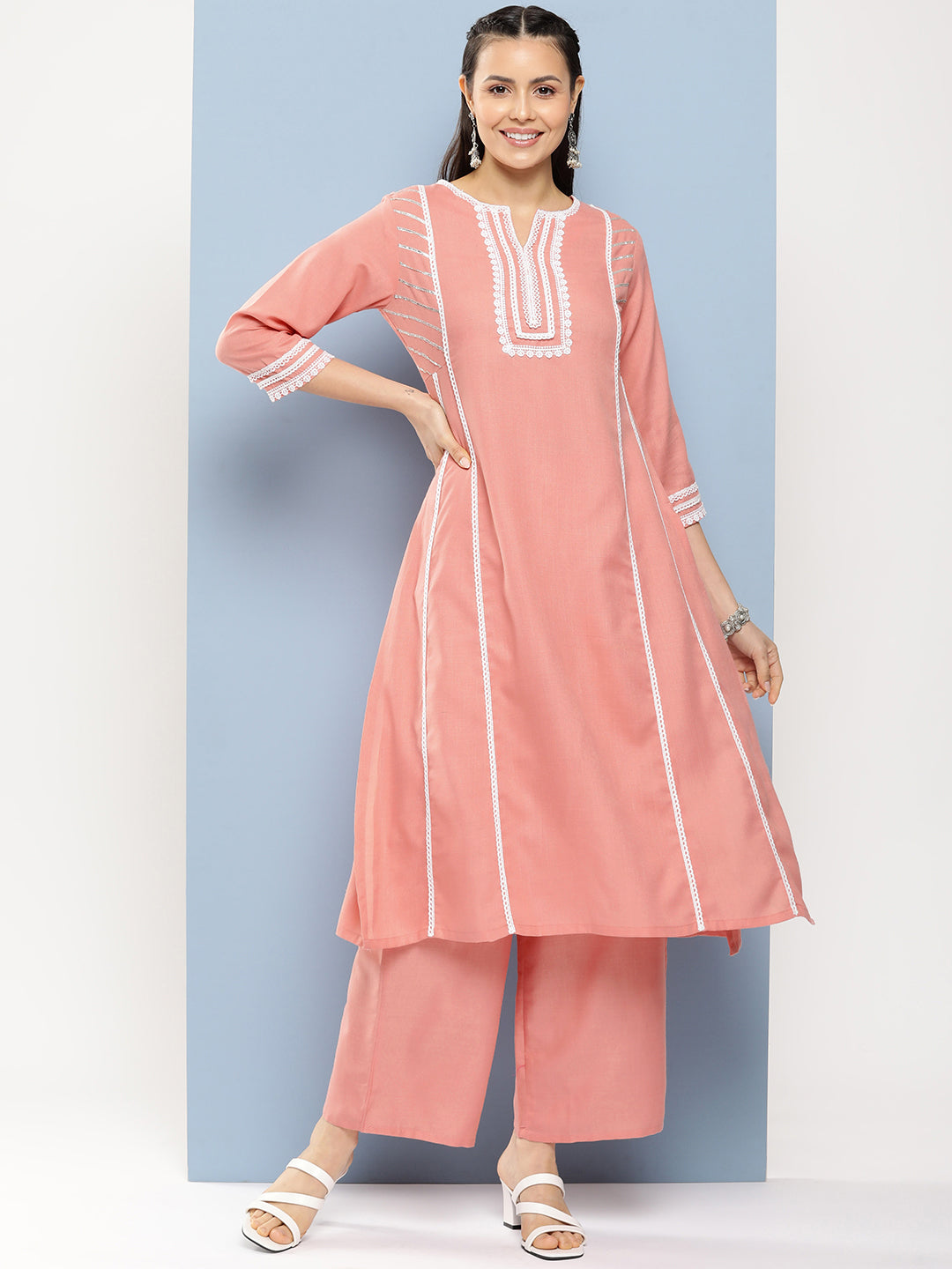 Bhama Couture Peach Solid Lace Details Kurta With Peach Solid Palazzo.