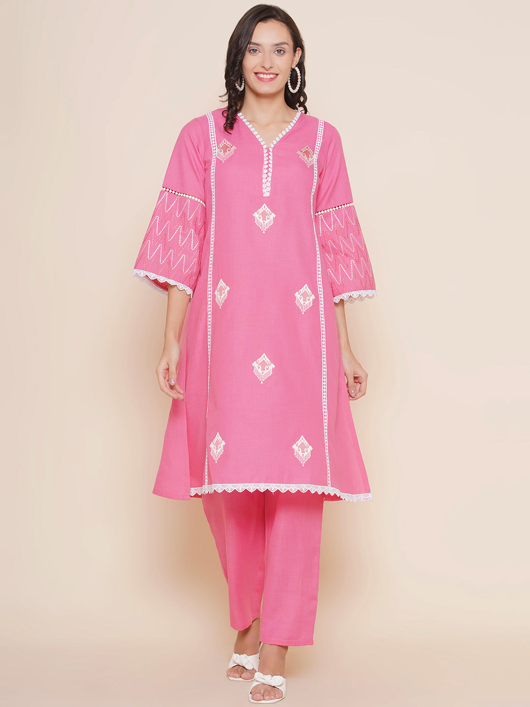 Pink Embroidered Kurta with lace detailing & Pink Solid Palazzos