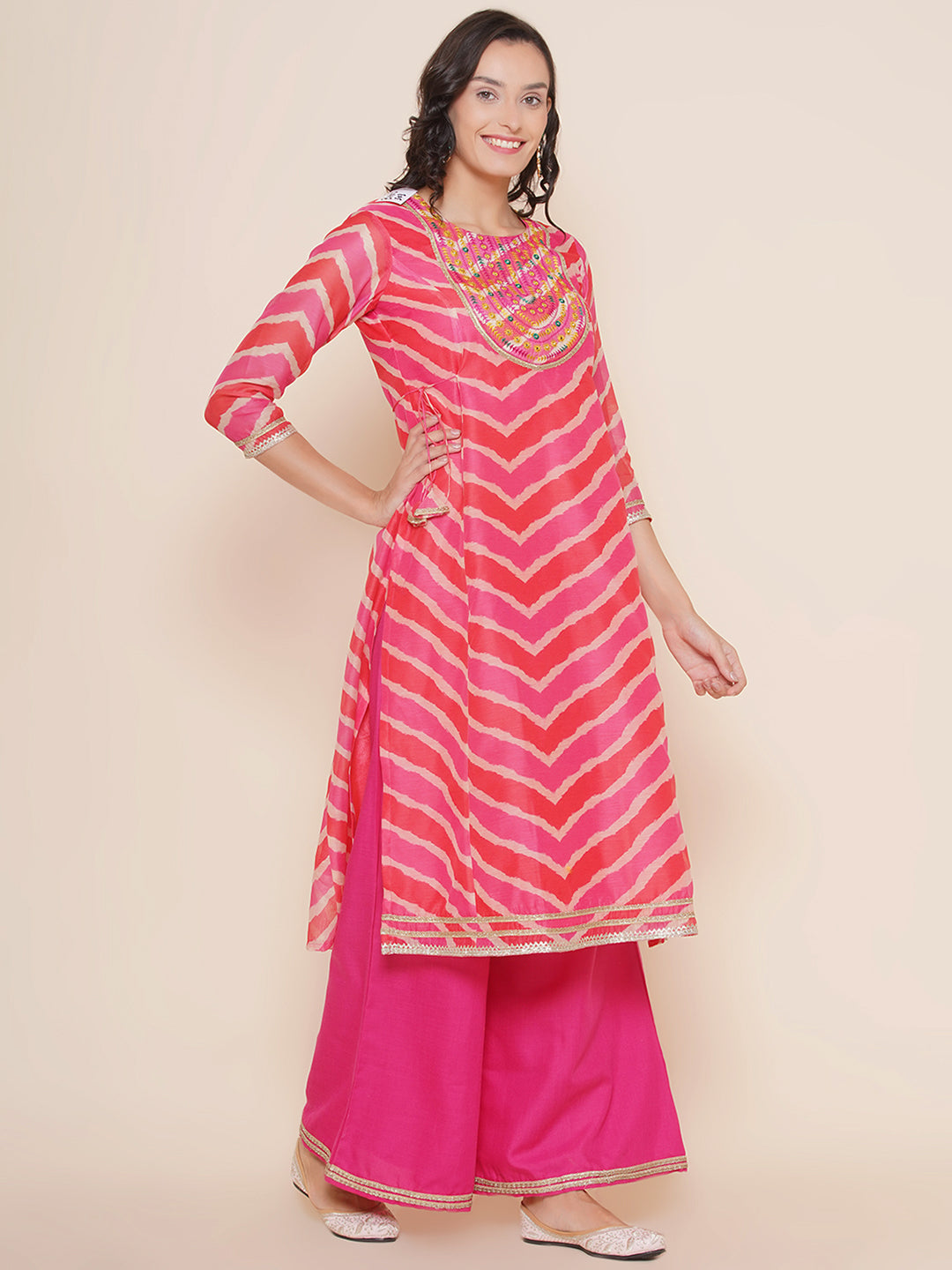 Bhama Couture Pink Leheriya Printed A-Line Yoke Embroidered Kurta & Pink Solid Plazzos With Dupatta