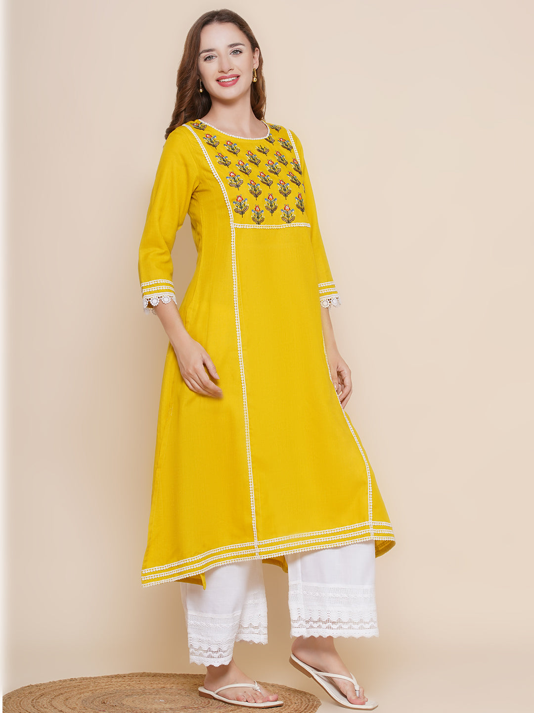 Yellow Yoke Design Embroidered Lace work Kurta With Off White Lace work Palazzos