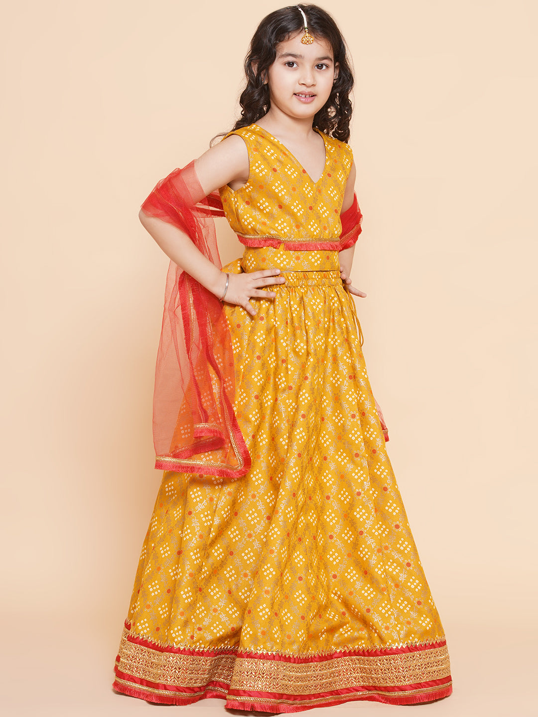 Bitiya By Bhama Girls Yellow Mustard Bandhej Printed Lace Work Lehanga,Choli With Dupatta.