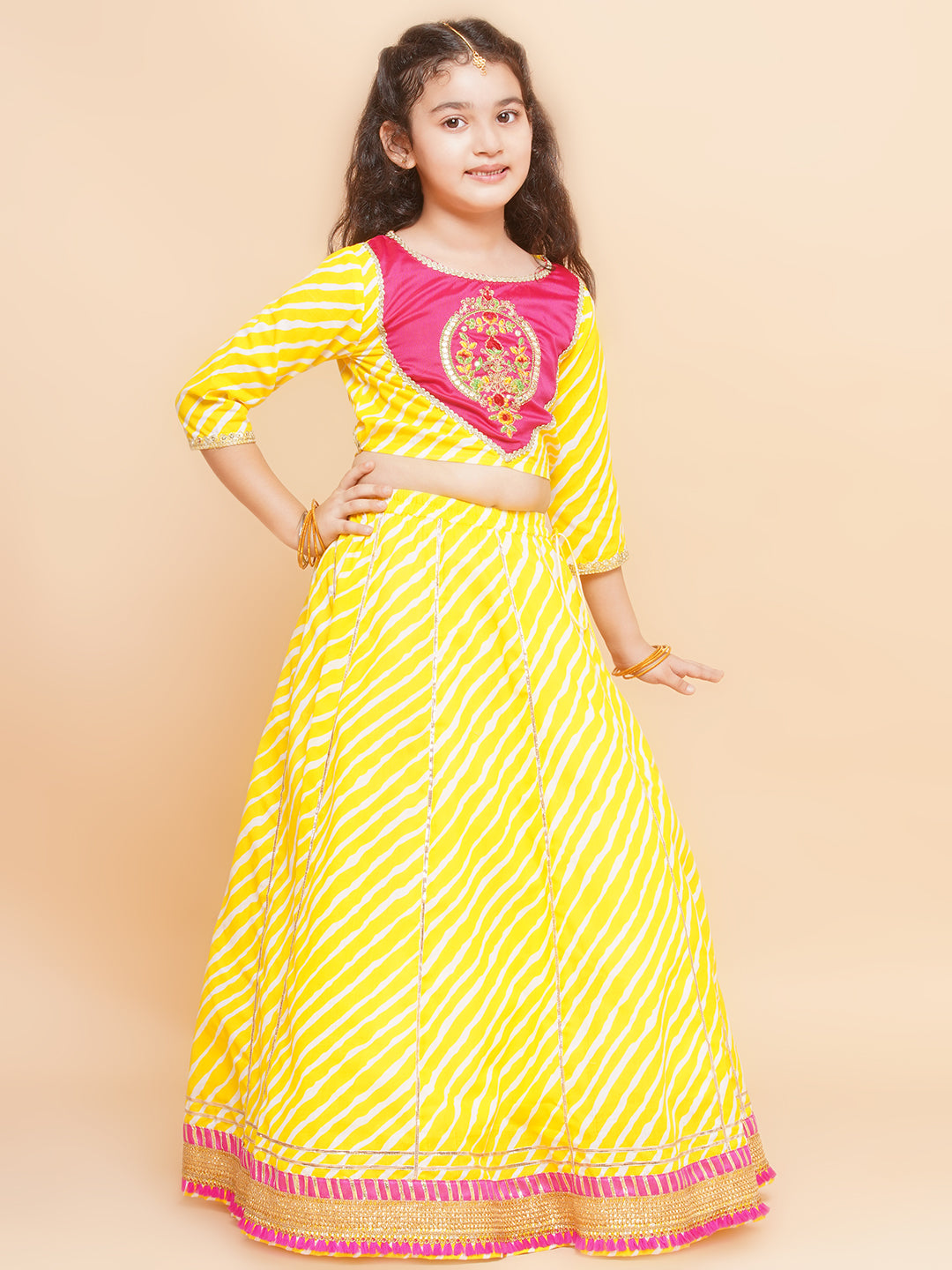 Bitiya by Bhama Girls Yellow Leheriya Printed Lehenga & Pink Embroidered Choli with Dupatta